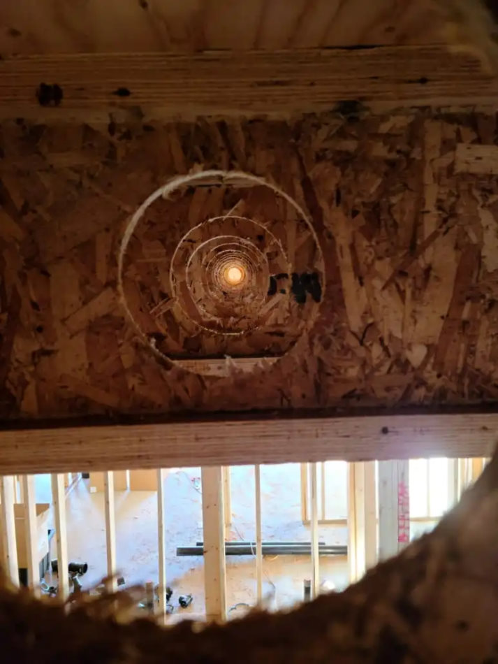 hole drilled through wood