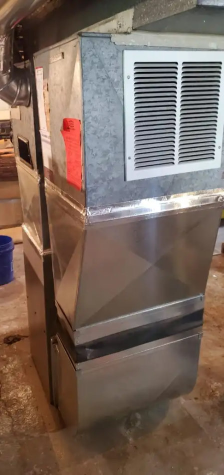 HVAC unit with vent and red label